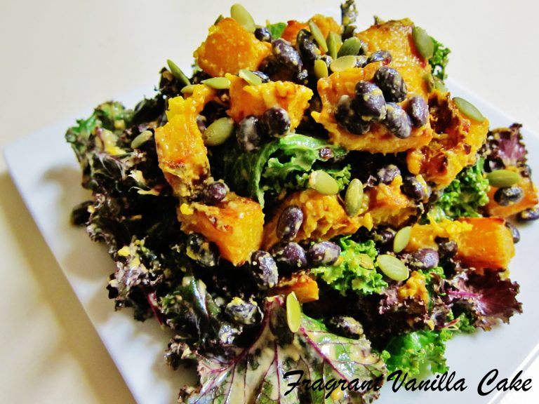 Roasted pumpkin and black bean salad on a white plate