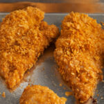 Baked chicken on a baking sheet