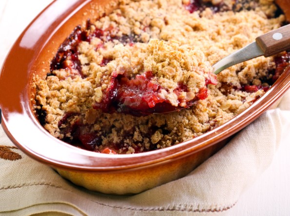 Banana crumble in bowl with spoon