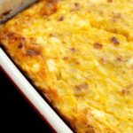 Cheesy Breakfast Bake in a white baking dish.