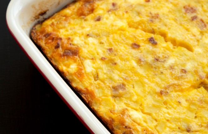 Cheesy Breakfast Bake in a white baking dish.