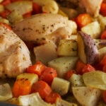 Herb roasted chicken with vegetables.