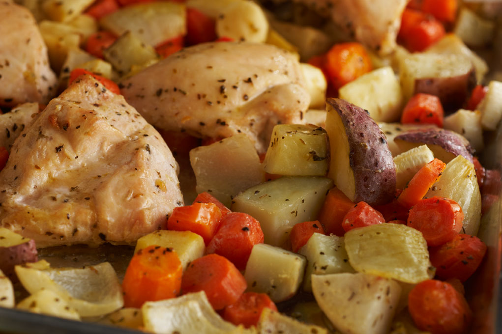 Herb roasted chicken with vegetables.