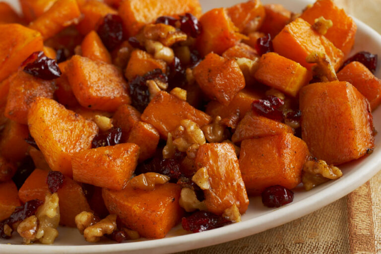 Roasted butternut squash on white plate