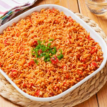 Square casserole dish with red Spanish rice.