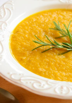 A closeup of a bowl of sweet potato soup