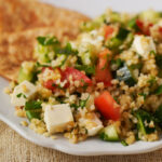 Tabbouleh in a white serving dish.