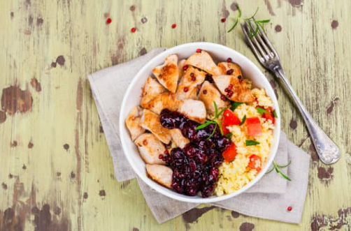 White bowl with thanksgiving leftovers.