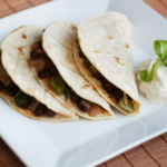 A plate of three tacos