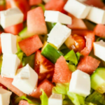 Tomatoes, cucumbers, and feta cheese mixed together.