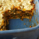 A closeup photo of a baking dish of tortilla lasagna