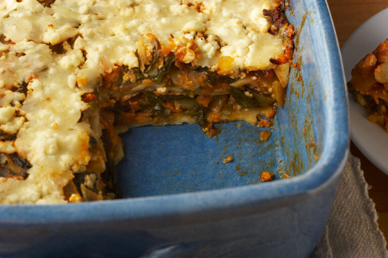 A closeup photo of a baking dish of tortilla lasagna