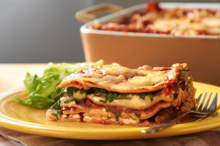 Vegetable lasagna on a yellow plate