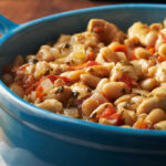 White bean chicken chili in a blue pot.