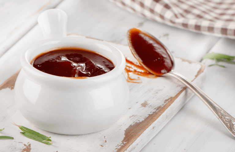 BBQ dipping sauce in a small white bowl