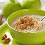 apple cinnamon oats in a green bowl