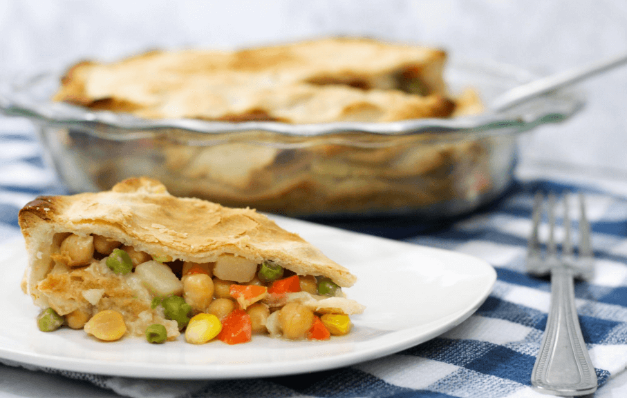 One slice of chickpea pot pie on a white plate.