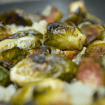 A lot of zesty brussels sprouts in a pan.