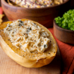 Spaghetti squash with a cheese and mushroom mix in it.