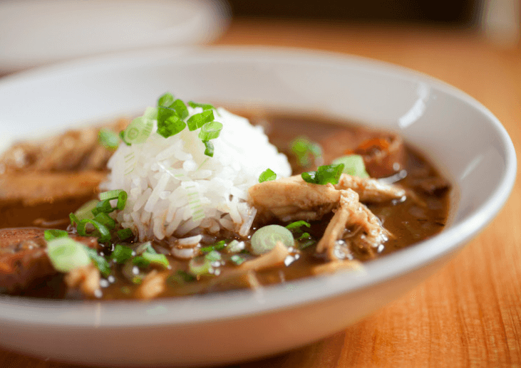 Shredded Chicken stew topped with barley.