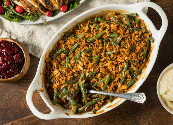 Green bean casserole in a white dish.