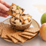 Apple Raisin dip with Graham crackers and two whole apples.