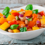 Garden Cannellini Bean Salad with tomatoes, chopped bell peppers, diced red onion, and white beans