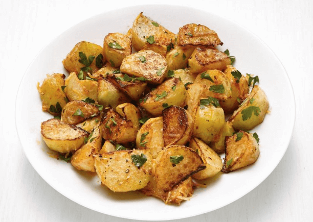 Diced kohlrabi with herbs and parmesan sprinkles.