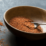 Taco seasoning in a bowl with a spoon.