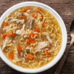 A bowl of chicken ramen noodle soup