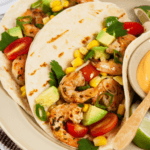 Tomato Corn Avocado Salsa on shrimp tacos