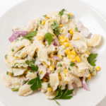 A plate of tuna pasta salad