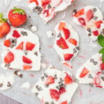 Frozen yogurt pieces with strawberries.