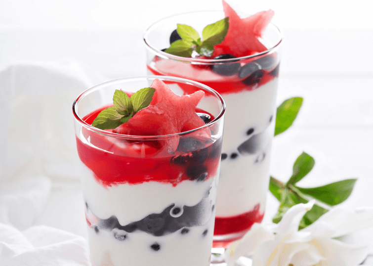 Two glasses of a berry parfaits