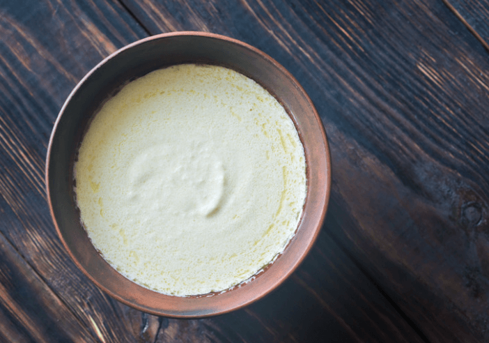 Cottage cheese Alfredo sauce in a brown bowl