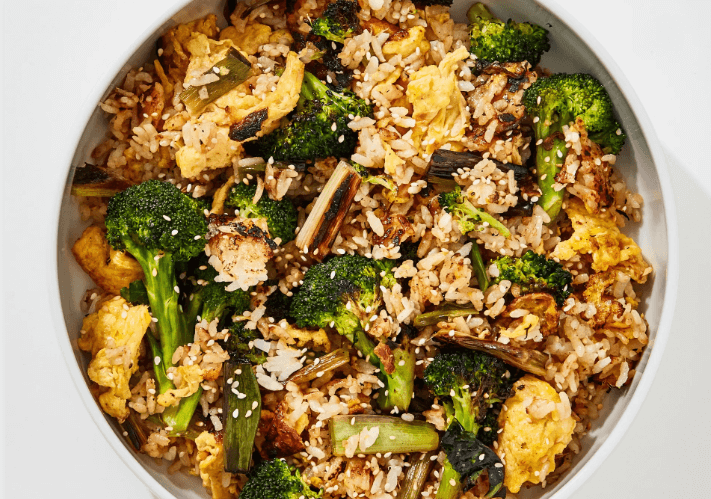 A bowl of egg and broccoli fried rice