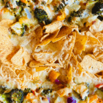 Broccoli Nachos with melted cheese and peppers