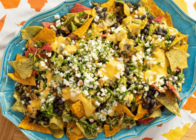 Nachos on a light blue serving tray