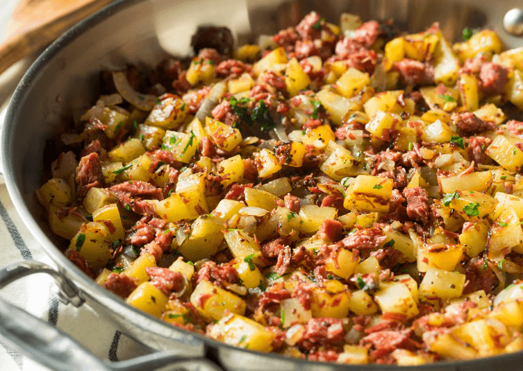 Potatoes and beef hash in a pan