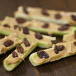 Celery sticks with peanut butter and raisins.