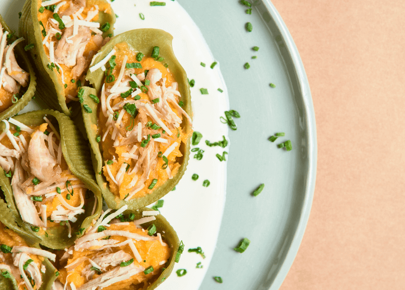 green stuffed shells with whipped pumpkin.