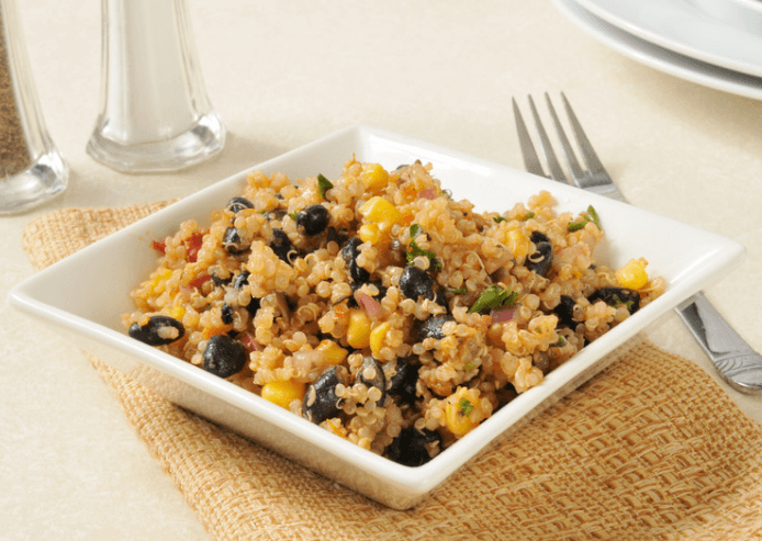 Black beans and couscous salad in a square dish