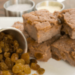 Blue corn bread slices along side of raisins