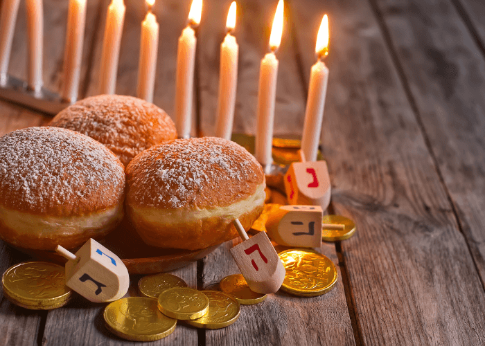 Hanukkah candles with pastries