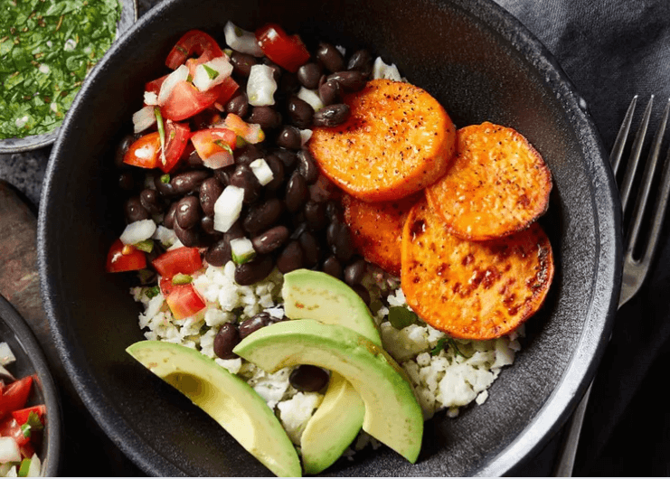 Cauliflower rice, sliced sweet potato, black beans, avocado bowl