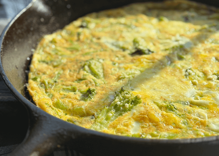 Broccoli Feta Frittata in a cast iron skillet