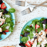 Greens, chicken, strawberries, with poppy seed dressing