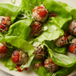 Pork and scallion meatballs with leafy greens