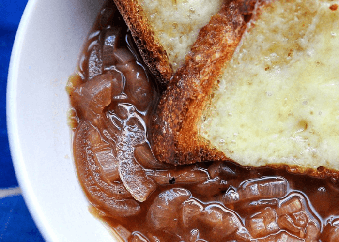 French onion soup in a bowl with bread