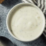 Vegetable ranch dip in a serving dish with Greek yogurt